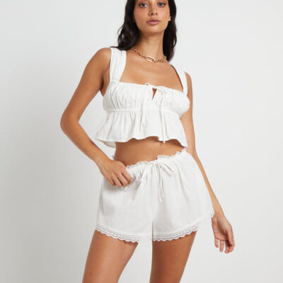 Subtitled Franki Peplum Top in White