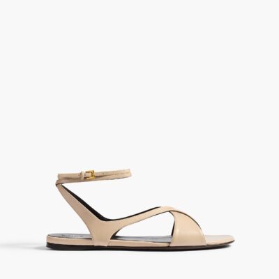 Khaite Liria Ankle Strap Flat Sandal in Nude Glazed Leather - Image 1