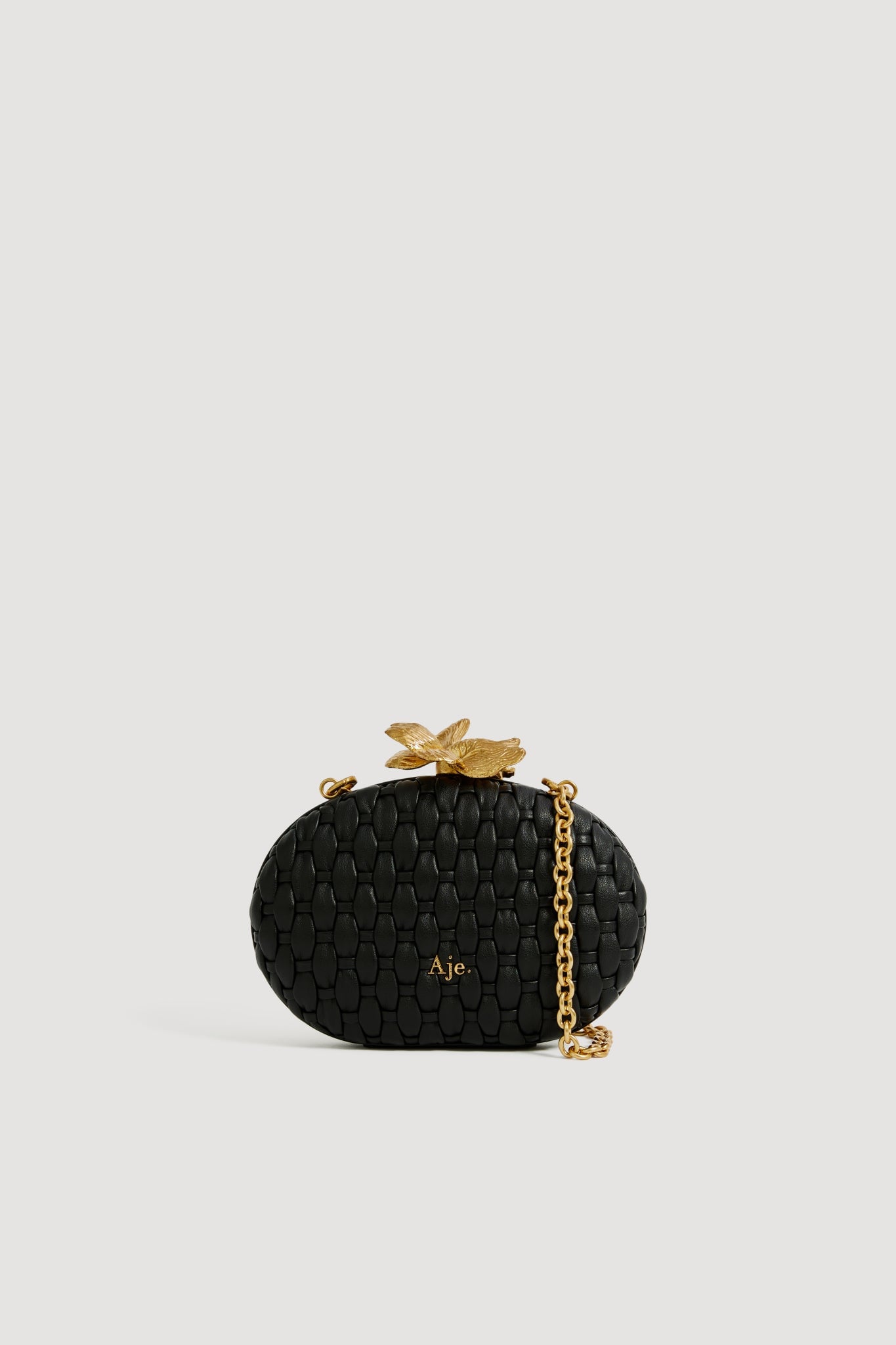 Aje Retrofete Woven Clutch - Image 1