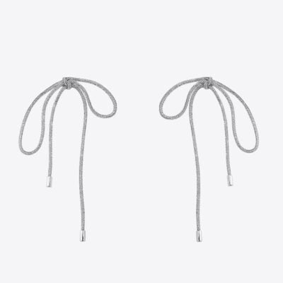 AREA Long Crystal Knot Earrings - Image 1