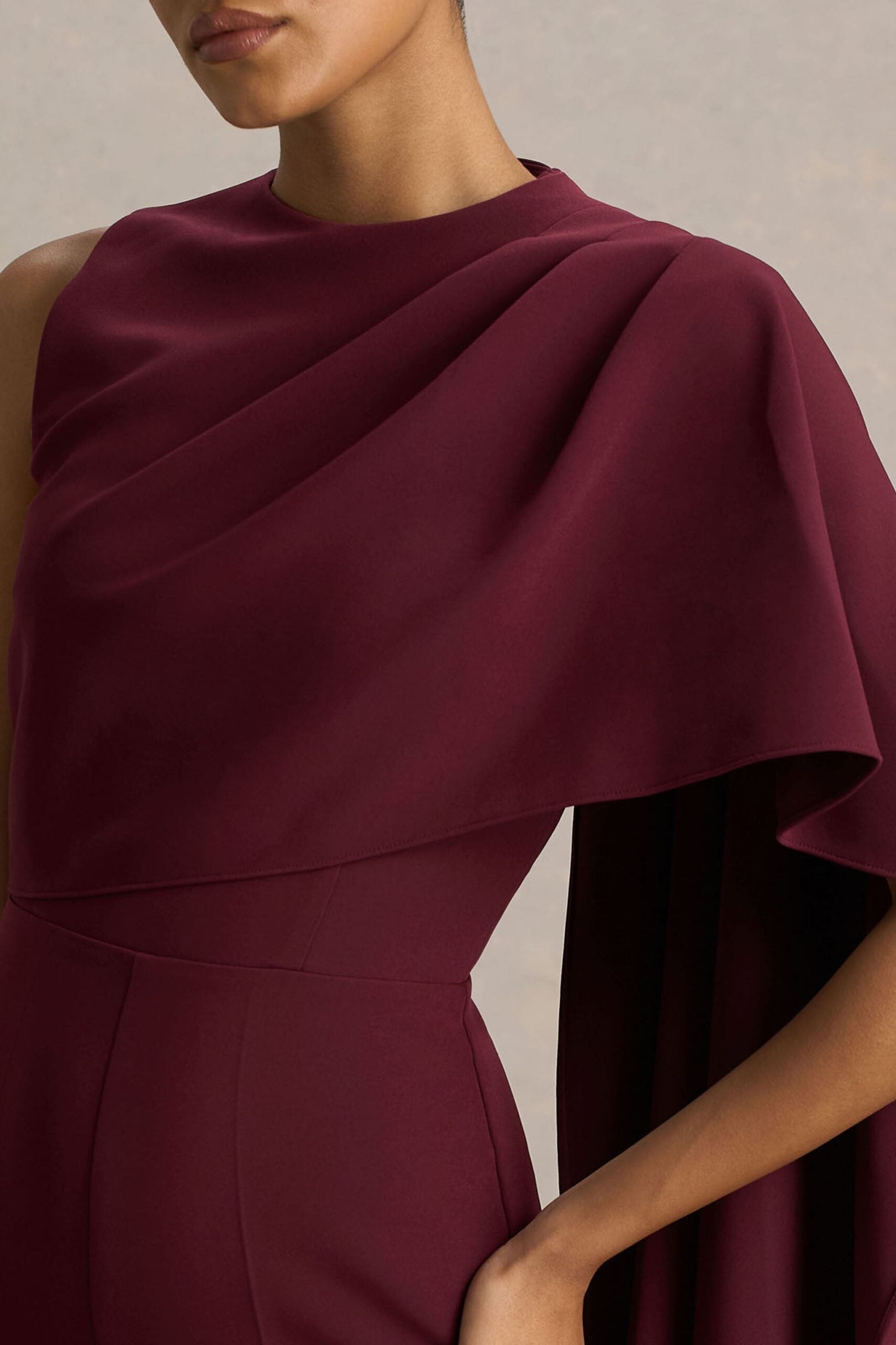 MNCLL131026150712258_3 Club L London Sorenia | Burgundy High-Neck Jumpsuit With One-Cape Sleeve - Image 3