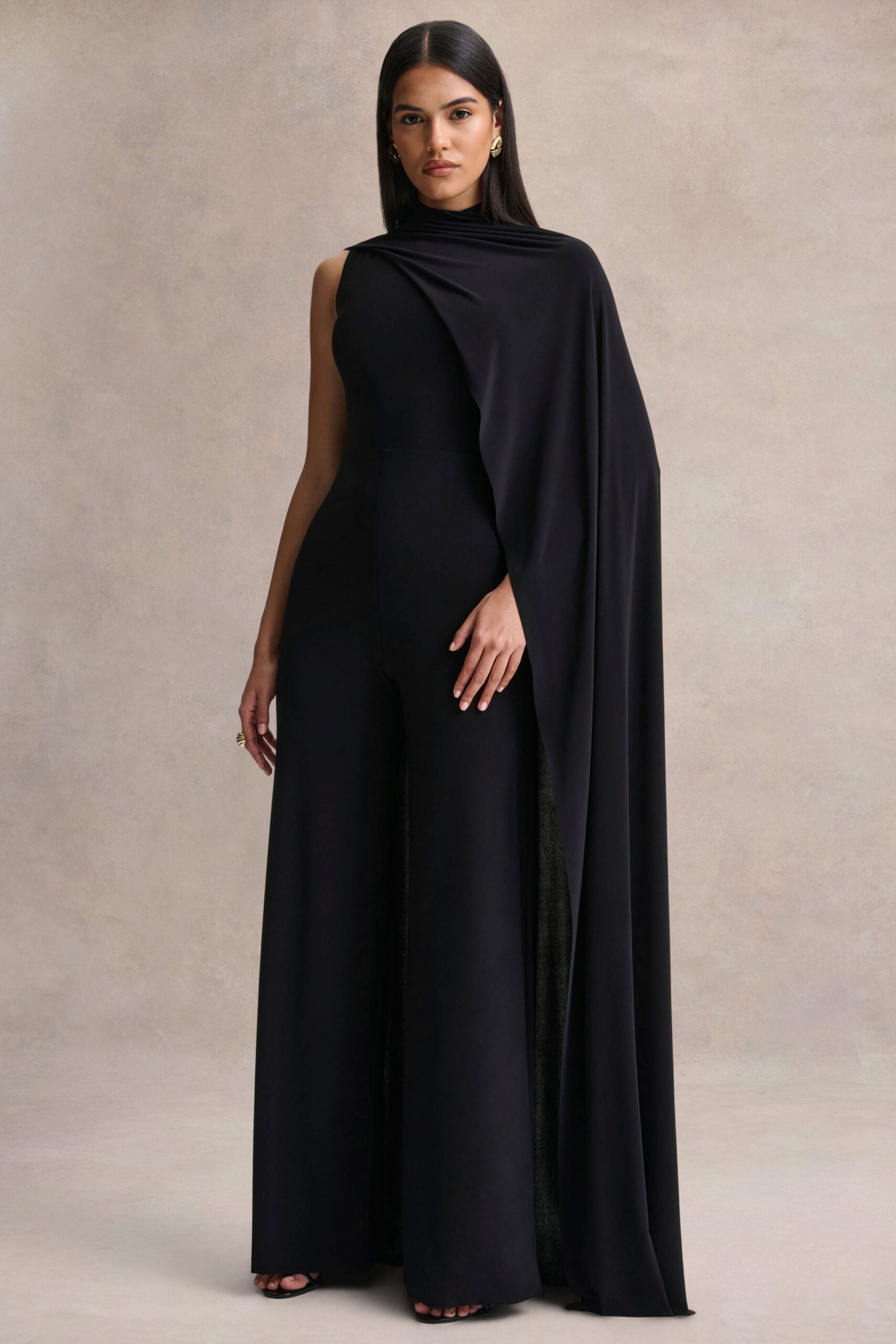 Club L London Seema | Black High-Neck Jumpsuit With Cape - Image 1