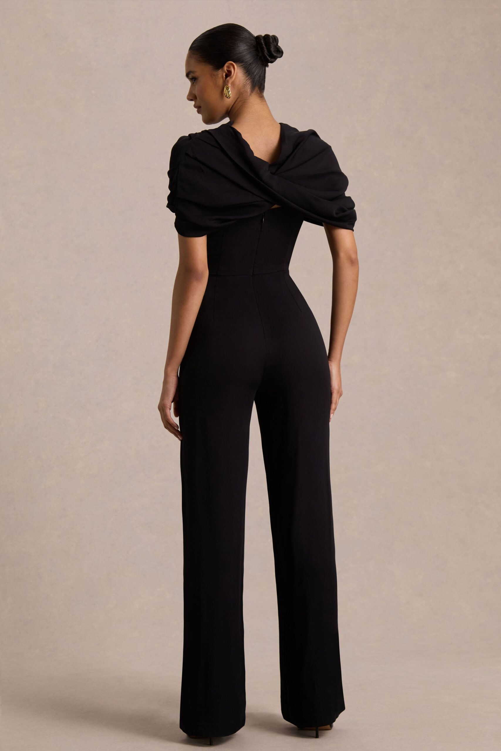 Club L London Raquel | Black Asymmetric-Neck Jumpsuit With Twisted Cape Detail - Image 2