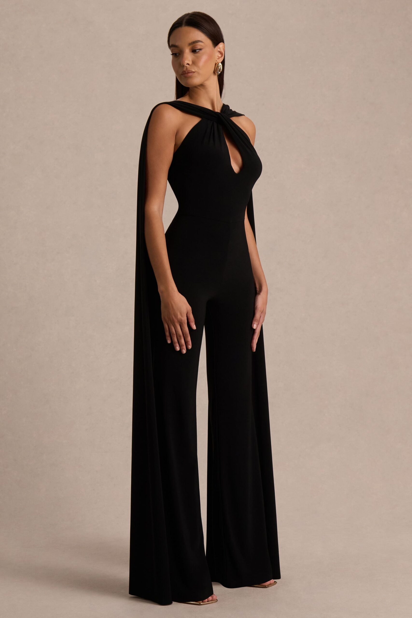 Club L London Mindy | Black Twist Halter-Neck Jumpsuit With Cape - Image 3