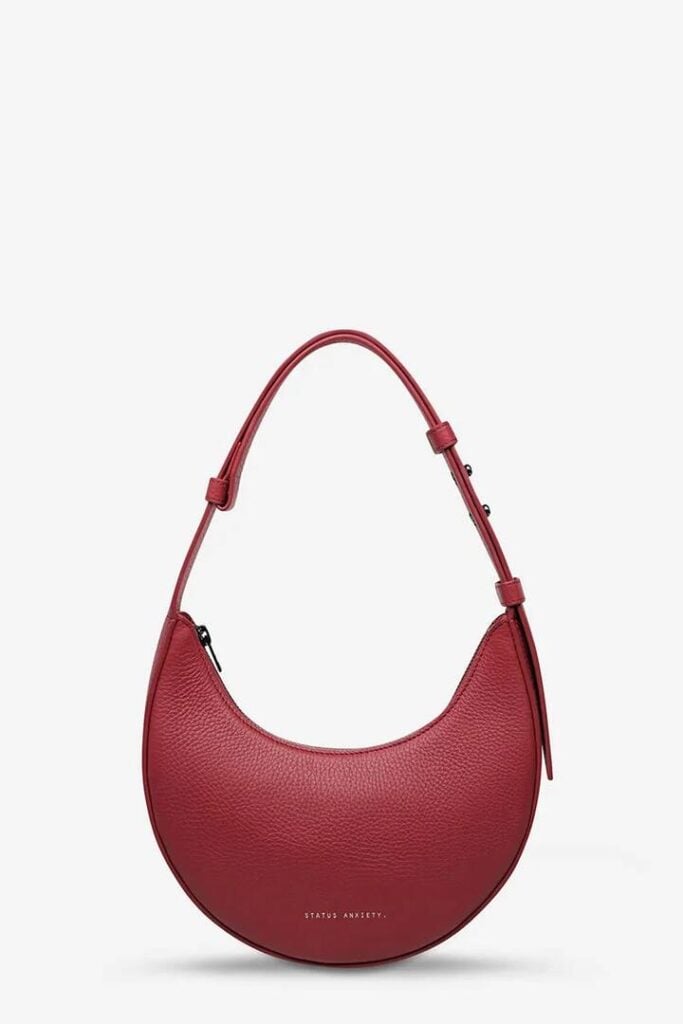 Status Anxiety Kind of Magic Rouge Crescent Shoulder Bag